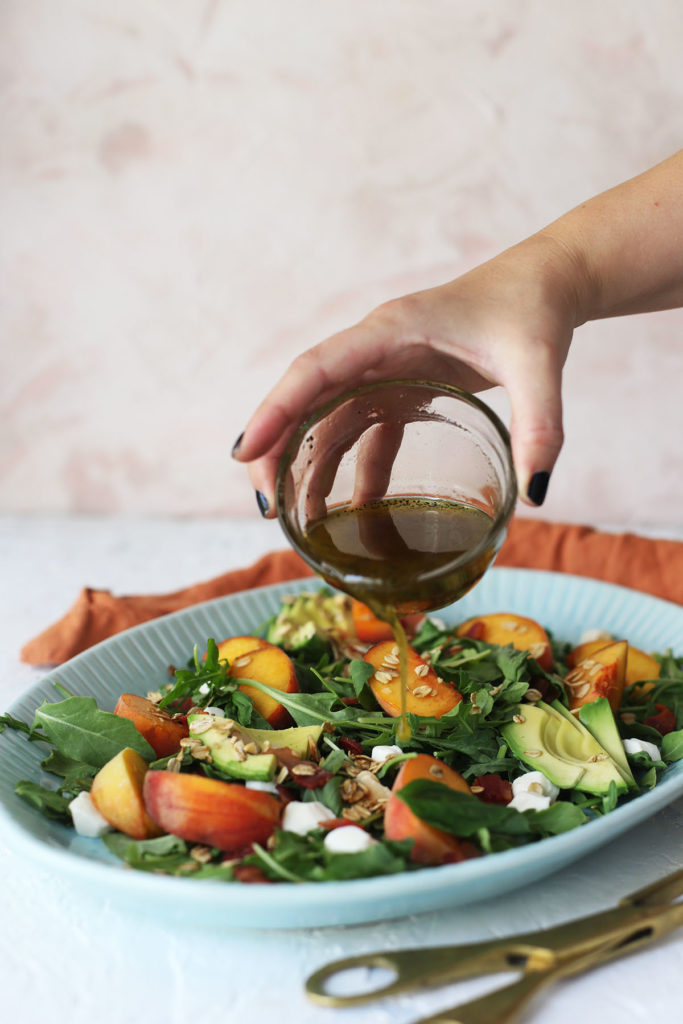 Arugula Peach and Crispy Bacon Salad with Maple Granola